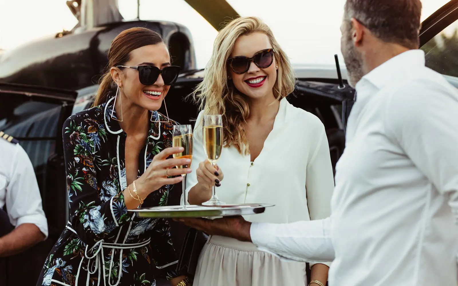 Affluent investor lifestyle community arriving by private aviation